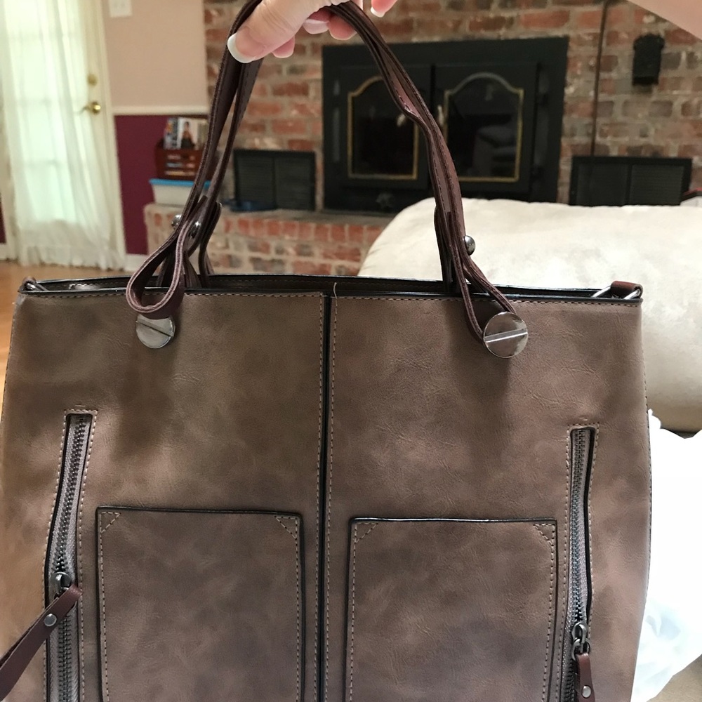 Handbag. Never used. Too small for my liking.